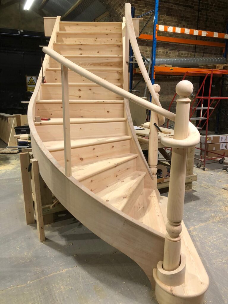 curved staircase and handrail