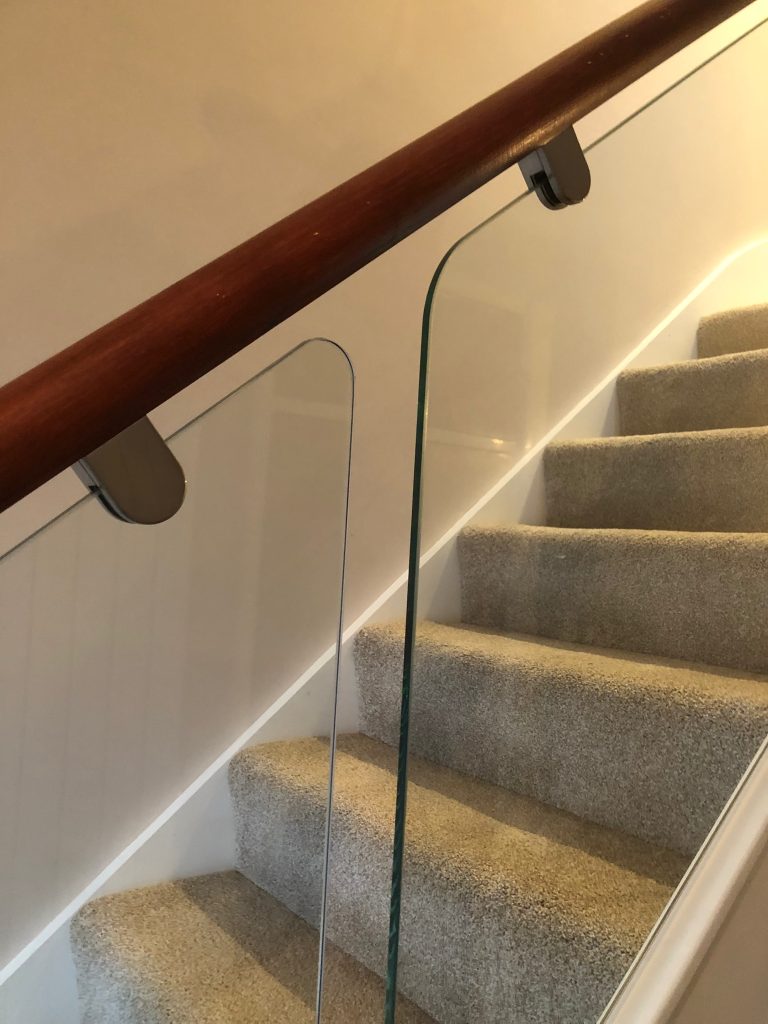 staircase with glass balustrade